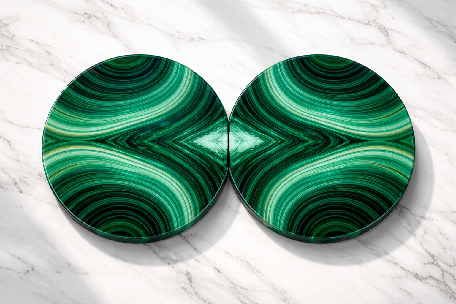 Bookmatched malachite polished pair on display